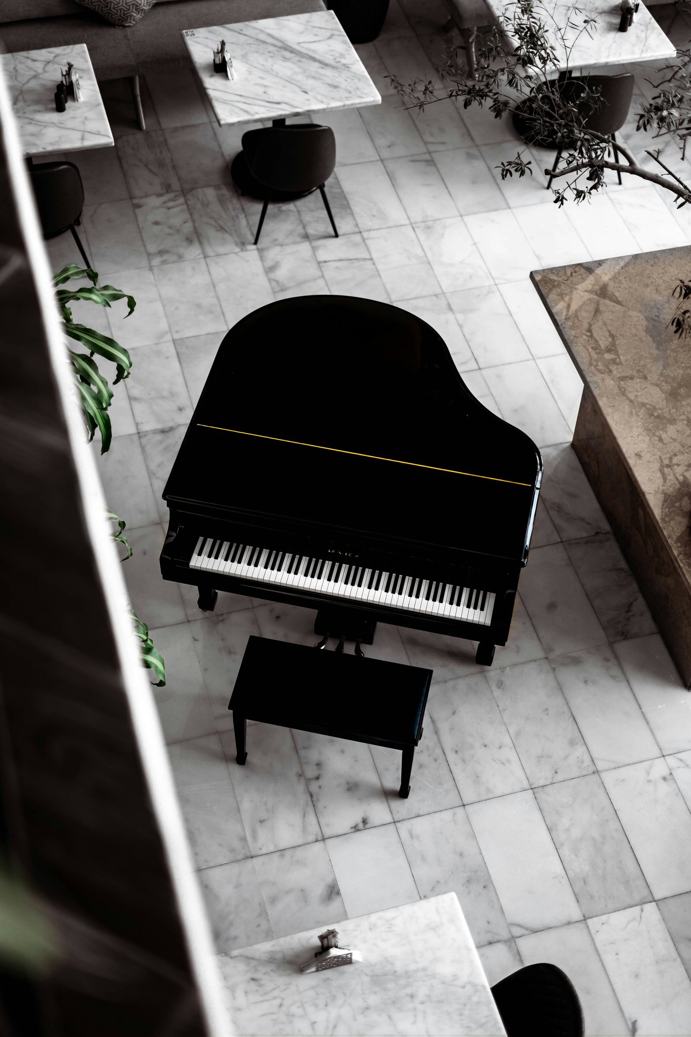 Grand piano in an elegant marble lobby